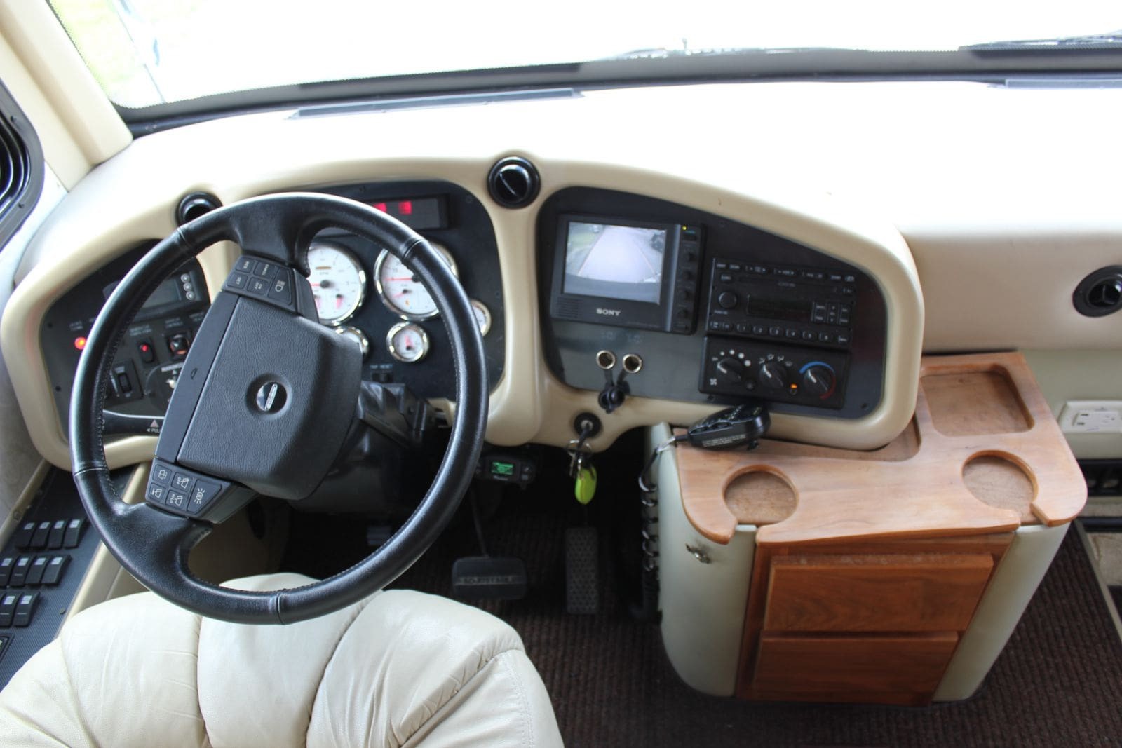 (Sample) The driver's seat of the 2005 Tiffin Allegro Bus